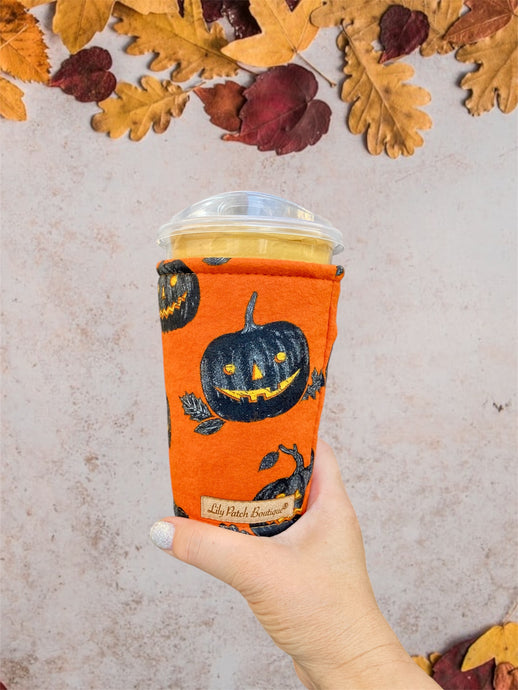 Black Jack-O-Lantern on Orange  with PumpkinsInsulated Cup Cozy / Coffee Cozy