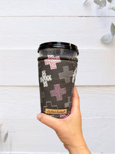 Pink Plus Signs on Black Coffee Cozy